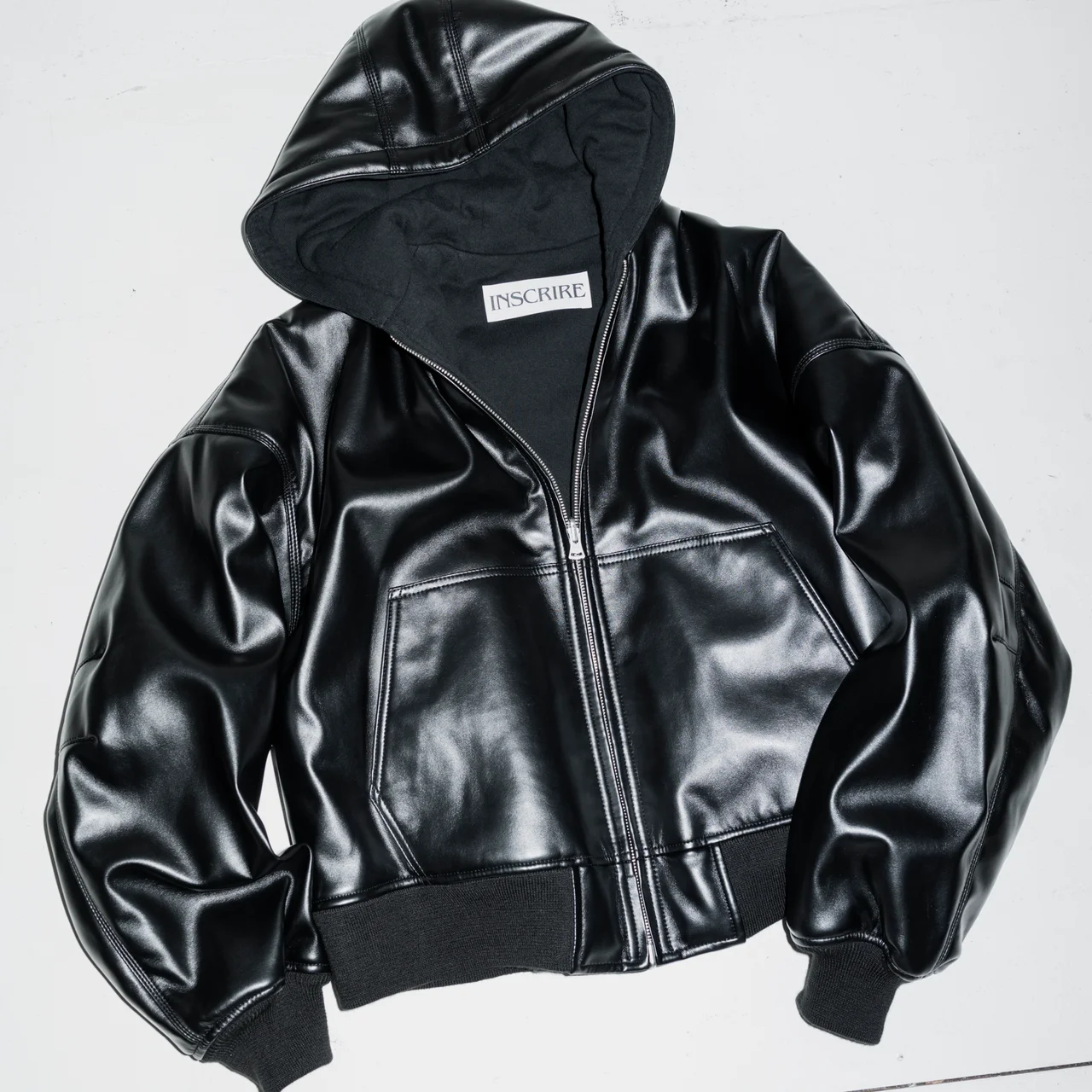 INSCRIREのレザージップフーディ