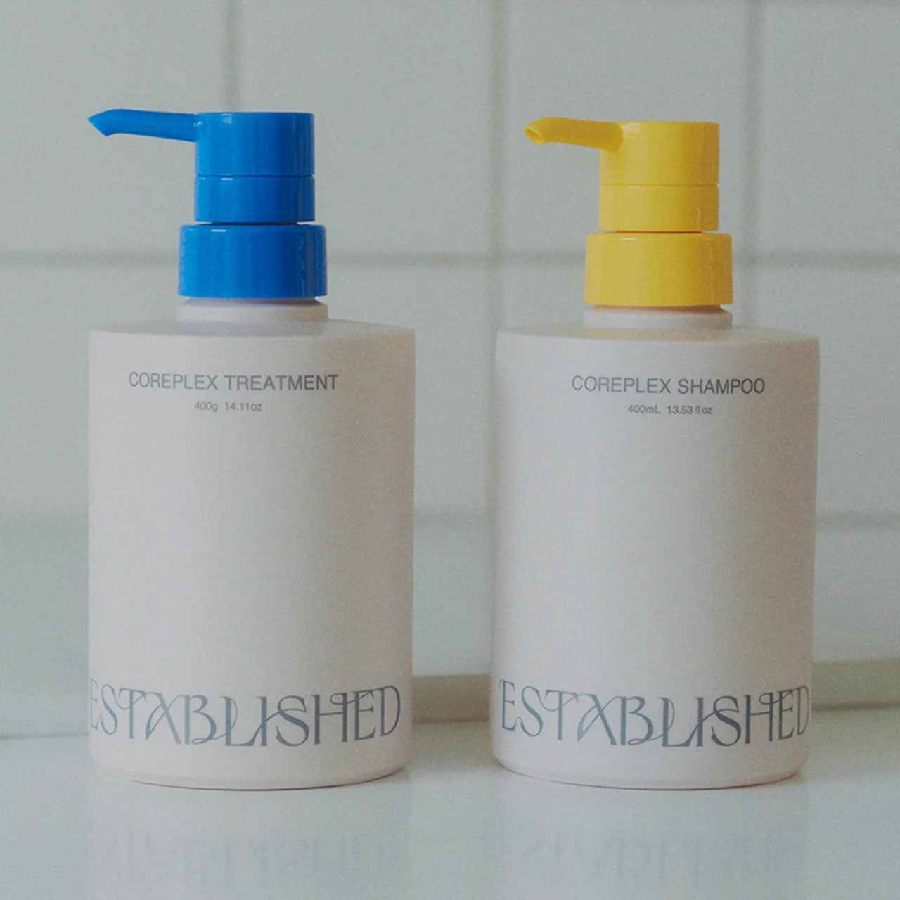 ESTABLISHED｜（右）コアプレックス シャンプー／（左）同 トリートメント