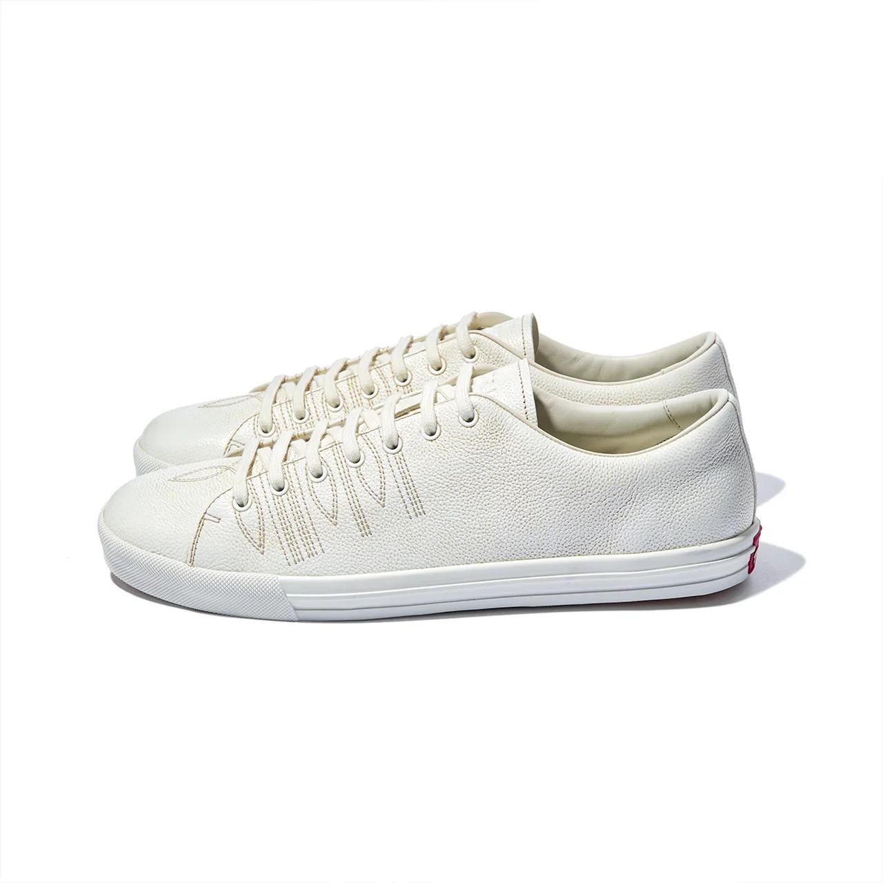 PRADA｜Aged-effect leather sneakers