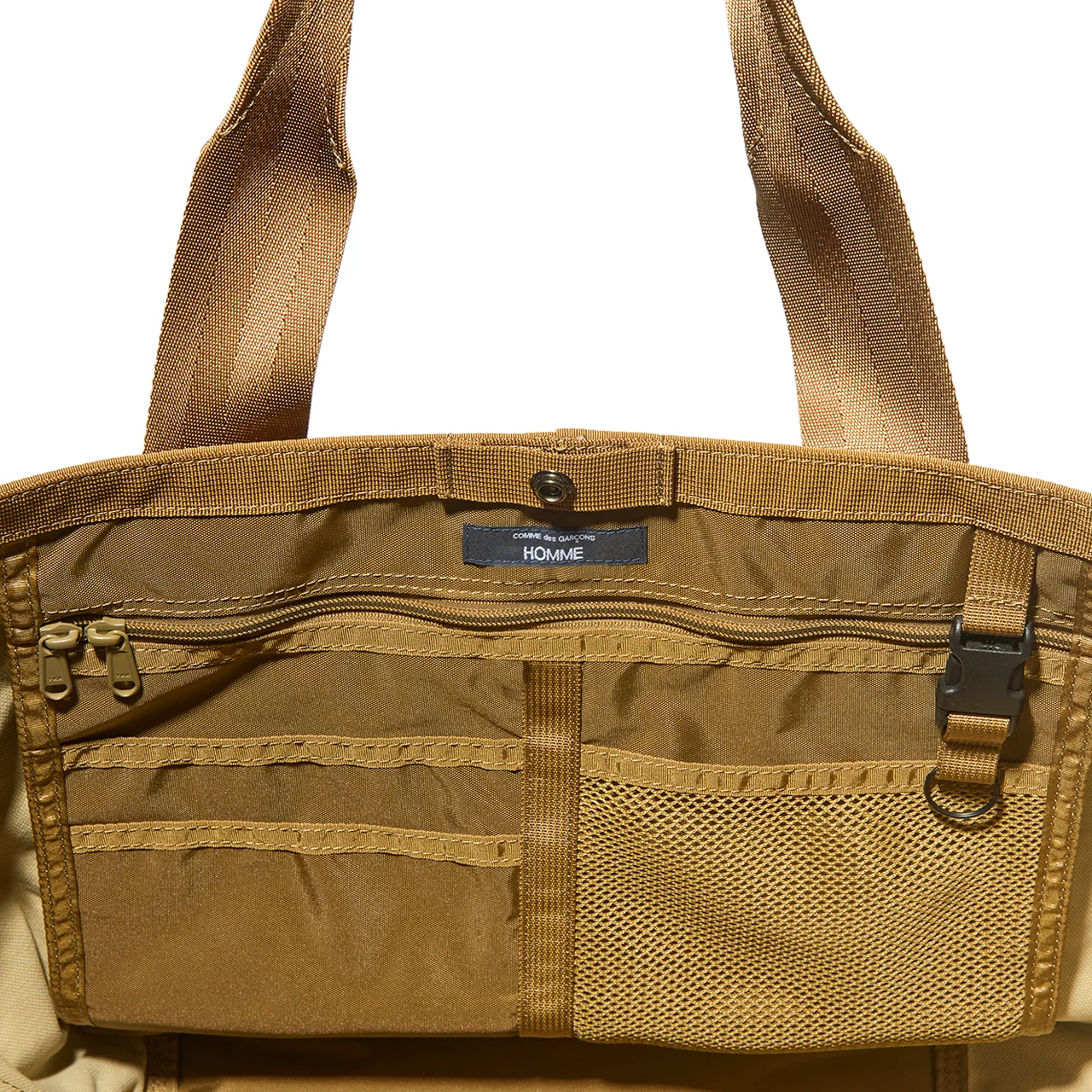 オーガナイザーポケットなど内側の仕様もオム独自のスタイルに変更