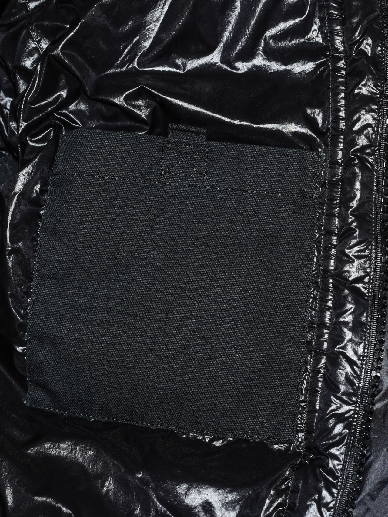 sacai x Carhartt WIPのウォッシュド ダック パファージャケット