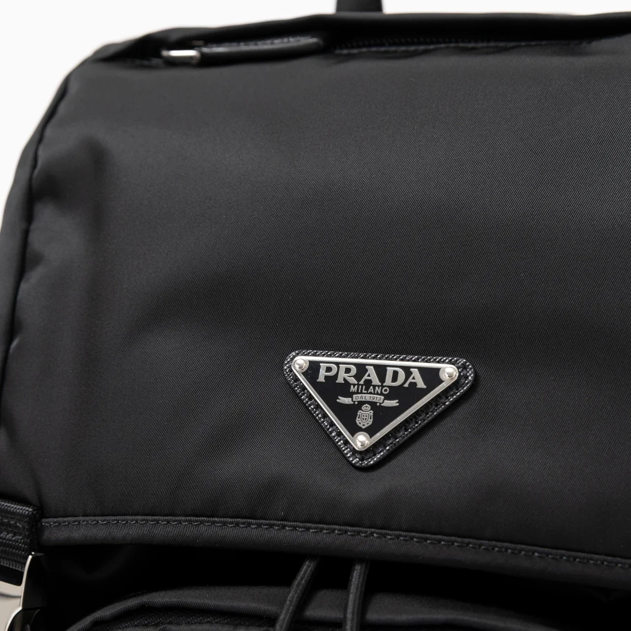 PRADA｜Re-Nylon Xサフィアーノレザー バックパック