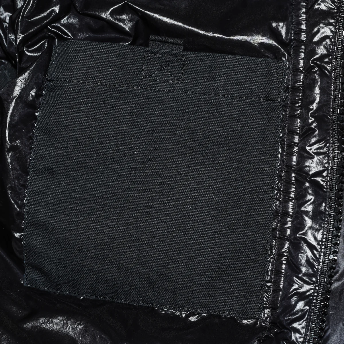 sacai x Carhartt WIPのウォッシュド ダック パファージャケット