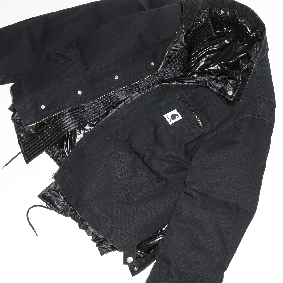 sacai x Carhartt WIPのウォッシュド ダック パファージャケット