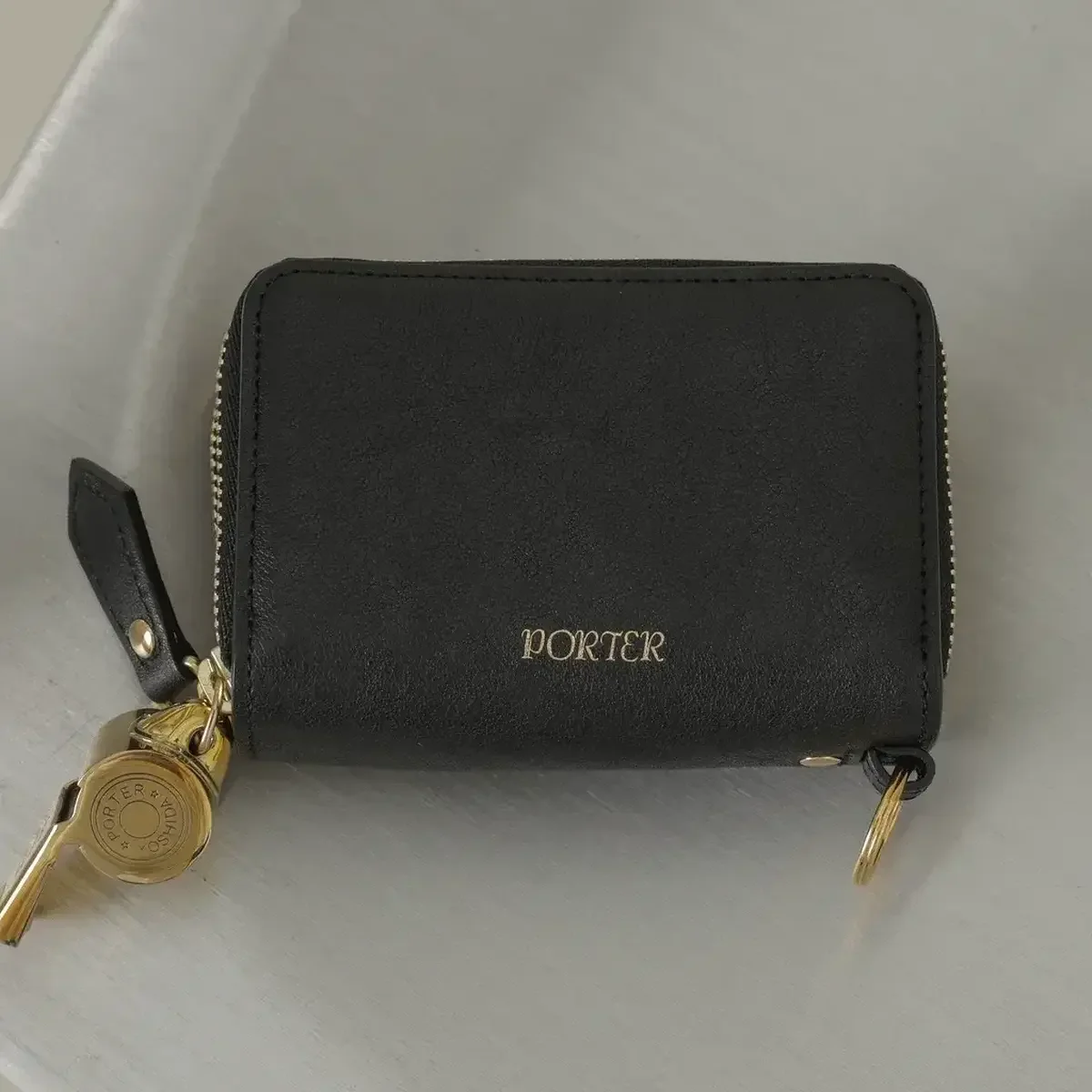 【吉田カバン】大人が買うべきポーター、POTRの「隠れ名品小物」5選。レザーキーケースから旅ポーチ、折りたたみ傘まで【PORTER】